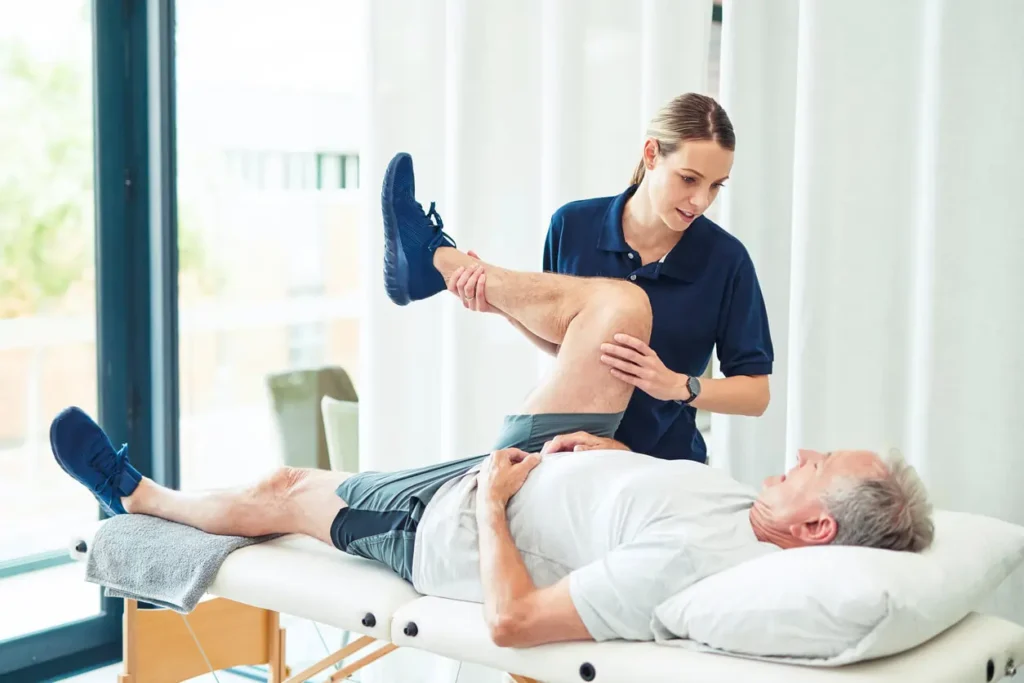 Revitalising Recovery: Effective Rehabilitation Strategies for Muscle Injuries 3 Physiotherapist assisting a patient with muscle recovery exercises Bexleyhill
