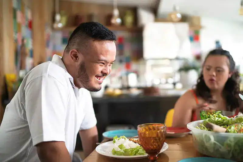 Empowering Weight Loss: A Comprehensive Guide for Individuals with Disabilities 2 Image of a disabled man and balance around nutrition to aid weight loss Bexleyhill