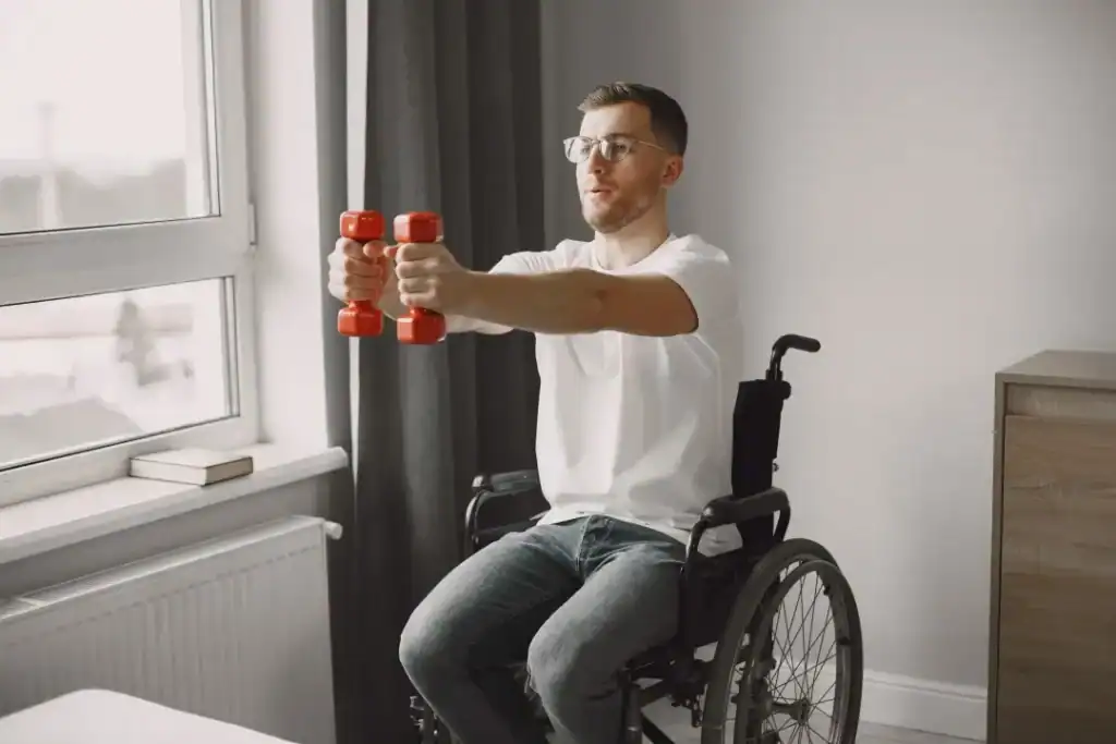 Image of man doing exercise in his wheelchair to aid weight loss Bexleyhill