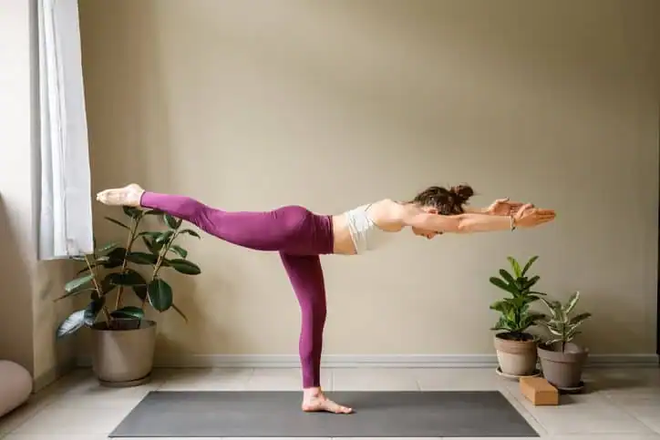 Achieving the Perfect Tone: How Often Should You Exercise for Results? 1 Woman doing Yoga exercise Bexleyhill to help with toning the body.