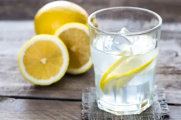 Hydration: The Secret Ingredient for a Toned Stomach and Enhanced Fitness 2 Image of lemon water to aid hydration Bexleyhill