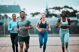 Sculpting Sleek Arms: The Essential Role of Cardio in Toning Without Bulking Up 3 image of people running to incorporate cardio Bexleyhill exercise into their life to help tone arms and body.